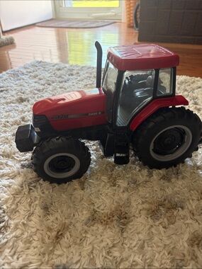 Case IH MX120 1/16 scale toy tractor produced by Ertl.